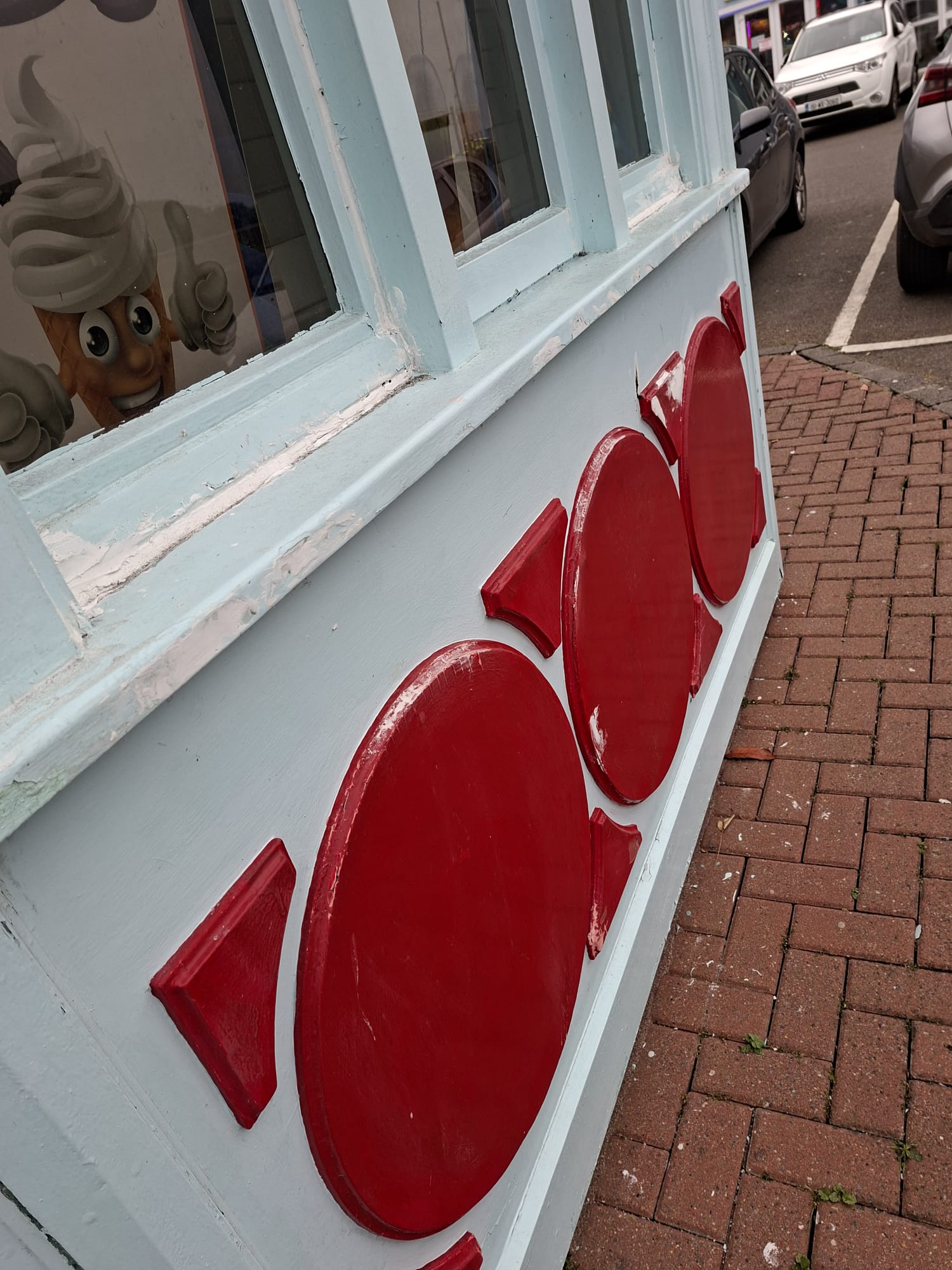Signage panels and trim refreshed — before