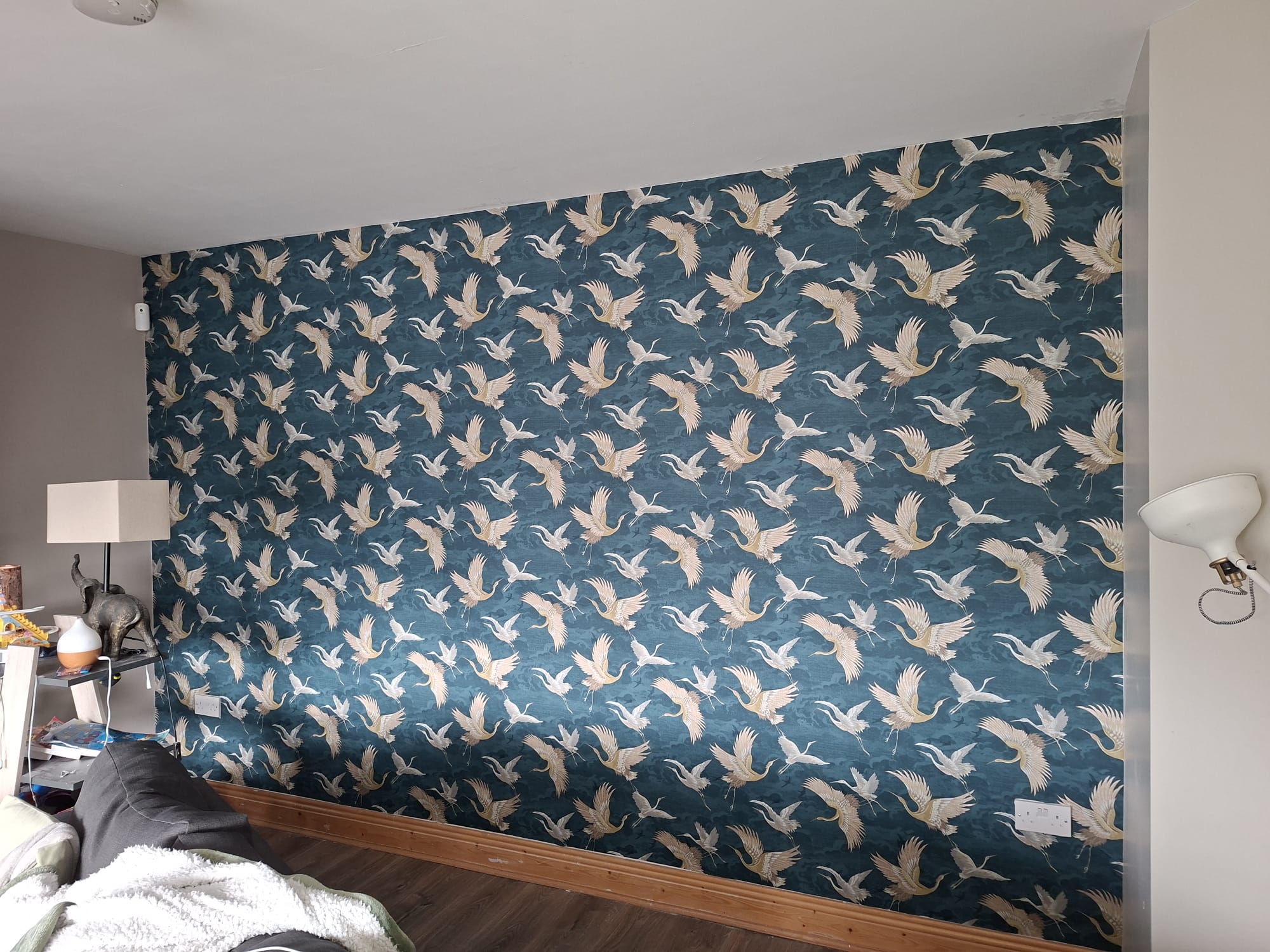 Crane feature wall in teal