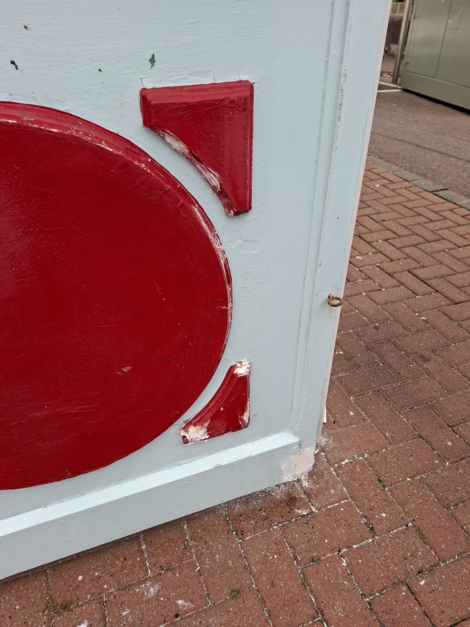 Chipped panels prepped and repainted — before